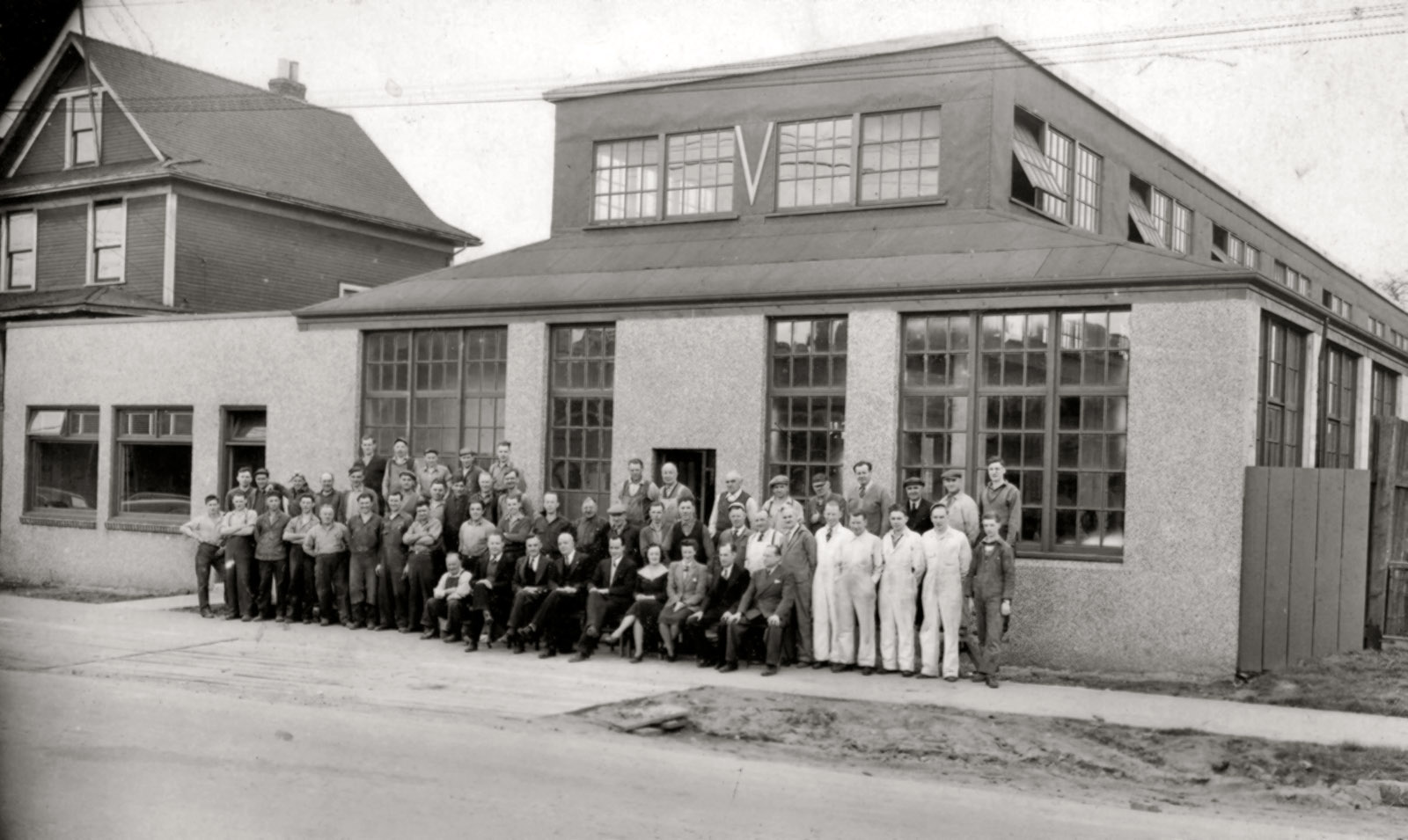 This is A-1 Steel in Vancouver B.C. mid to late 40's. My Grandfather was a pioneer of the steel industry and this was one of Canada's first. The employees staged outfront for the company photo with grandpa is in the center with my father (r) next to him. View full size.
