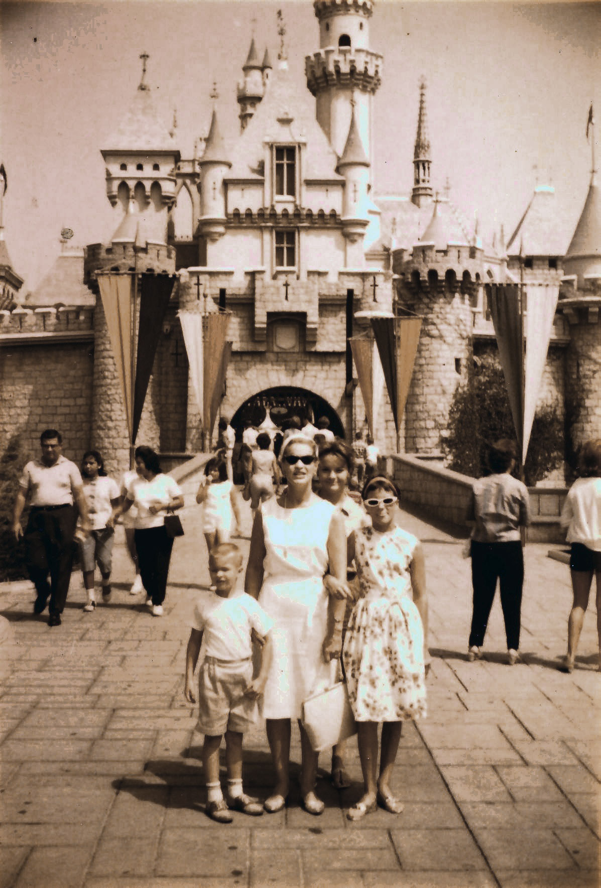 Here's a classic Disney/family picture from the  early 60's. Tom I'Anson family (L to R Mark, Marilyn, Cheryl, Maureen). Tom is taking the picture. View full size.