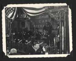 These are the Jive Bombers, A Navy jazz band. In this instance they are playing at a dance for CASU Operations sailors on Dec. 13, 1943 at the Jungle Inn near Sand Point, WA. CASU is an acronym for Carrier Service Unit. One of many snaps that I have of this somewhat wild night attended by my Mom &amp; Dad. 
Navy dance bandNotice how the leader is JUST out of the snap on the left! A Navy band early in the war would have likely been Artie Shaw, Al Donohue or maybe Tex Beneke. Shaw and Donohue led their own outfits, don't know if Tex did, or he was just a sideman. Thanks!
HJebone 
Texwas a sideman, and not with any name band, either. Just another gob. Artie wanted to be just another gob, signed up as Arthur Arshawsky and got billeted to a minesweeper. But the word got around...
Gory-Osky that&#039;s Peachy-Keen.Tex was with Miller... was he not?  He was with the Miller band after 1944 as well.
At least this music was hip...
Jive BombersMore info here.
Would appreciate any photos of the band which you would like to share!
kevin.bergsrud@seattle.gov
(ShorpyBlog, Member Gallery)