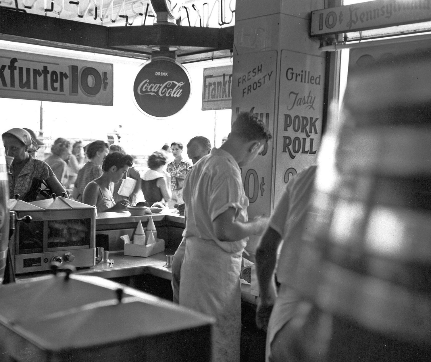 Another in a series of professional 8x10 pictures taken in Atlantic City in August 1953 for Better Living Magazine, featuring my in-laws. My mother-in-law is at the counter. View full size.
