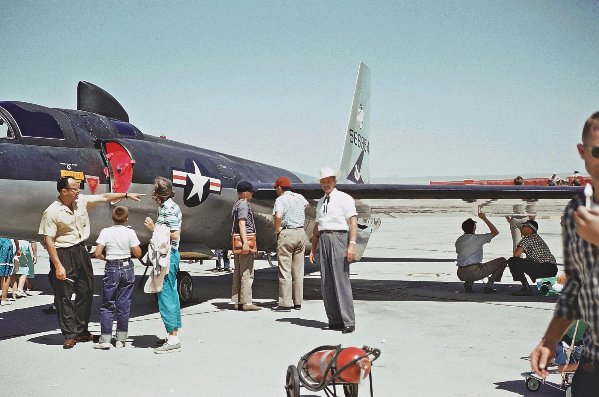 Edwards Air Force Base, California, open house in May 1961. Woodrow stands in front of a Lockheed U-2D, (Serial # 56-6954), a two-seat version of the U-2 spy plane. 35mm Kodachrome slide. View full size.