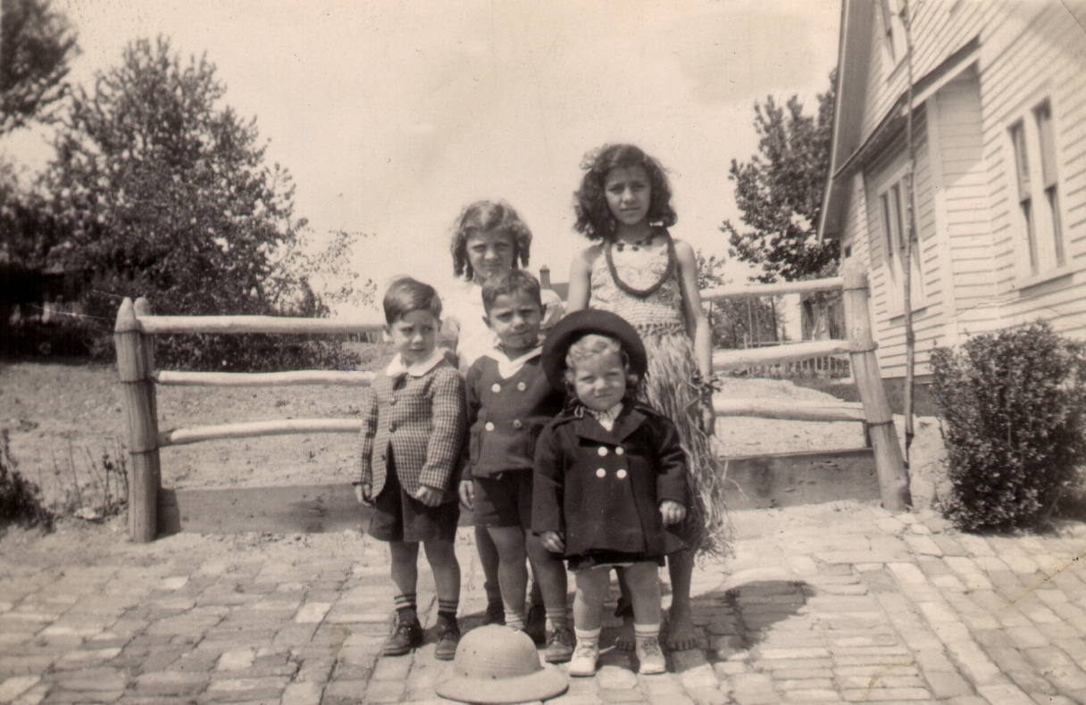 First row from left DT Cocco, cousins Angelo Veronese (deceased), Maryann Veronese, back row Catherine Veronese, Phyllis Veronese (deceased). Picture was taken in front of the Veronese residence in 1944. 