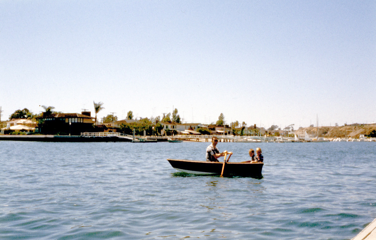 Every year my family would rent a cottage at Balboa Beach, located just south of Los Angeles. Here my brother and I are being chauffeured around Newport Bay by my father, who was doubtless down for the weekend. View full size.