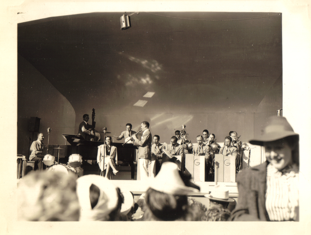 Great photo taken by a sailor from the USS California visiting San Francisco in 1939 of Benny Goodman and his band.  Fletcher Henderson on the piano, Nick Fatool on drums and Louise Tobin sitting next to the piano.