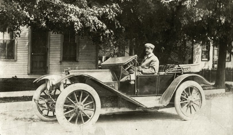 Bert Delos Heck (1871-1974) and his automobile in front of his house in Sidney Ohio. Bert was my great grandfather who spent his entire life in Sidney, OH. As a boy I was fortunate to have known him briefly. Anybody know what kind of car that is? View full size.

