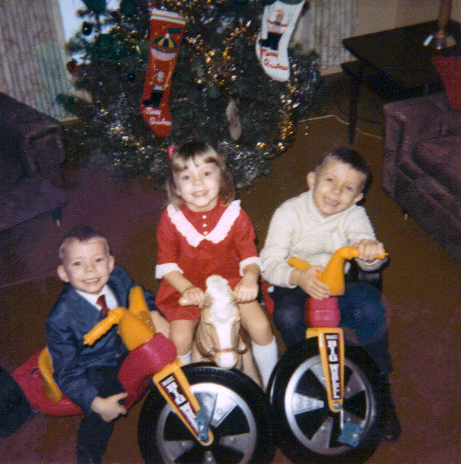 Christmas Day 1968, Elkins, WV.  Big Wheels for brother Bill and me.  A ride 'em horsey for sister Kim.  Best Christmas ever! View full size.