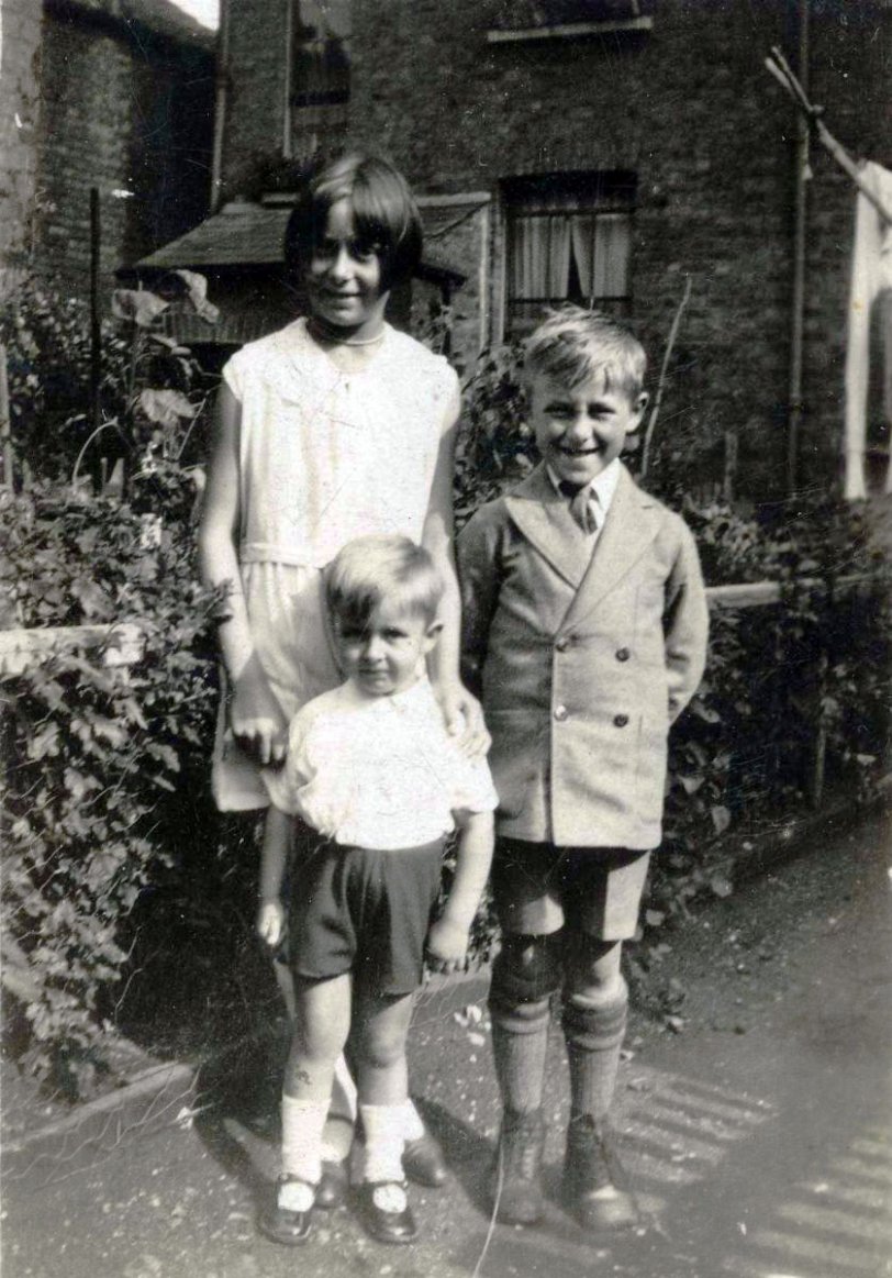 Putney, South London, England, 1934. Betty, Jack and little Ian in the garden of my grandparent's house. My Dad went on to fly B17s for RAF Coastal Command 10-12 years later. He's now the only one of his generation of the family still living. View full size.

