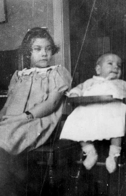 That dirty look my sister is giving me in early 1935 at our home in Newburgh, New York, is priceless! View full size.
