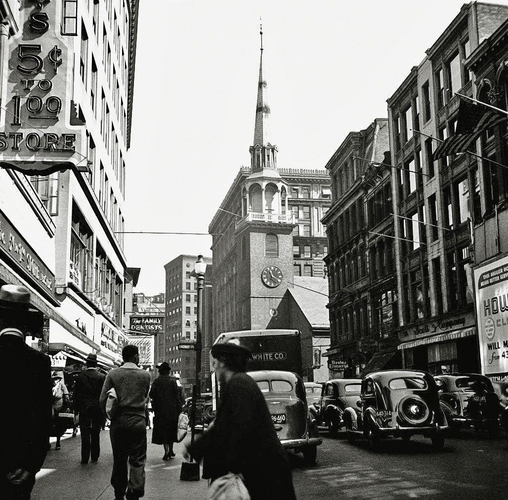 Downtown Boston, I tracked this to being at Washington and Milk St. On the right is a sign for a newspaper The Boston Transcript, which was published until 1941. From my negatives collection. View full size.