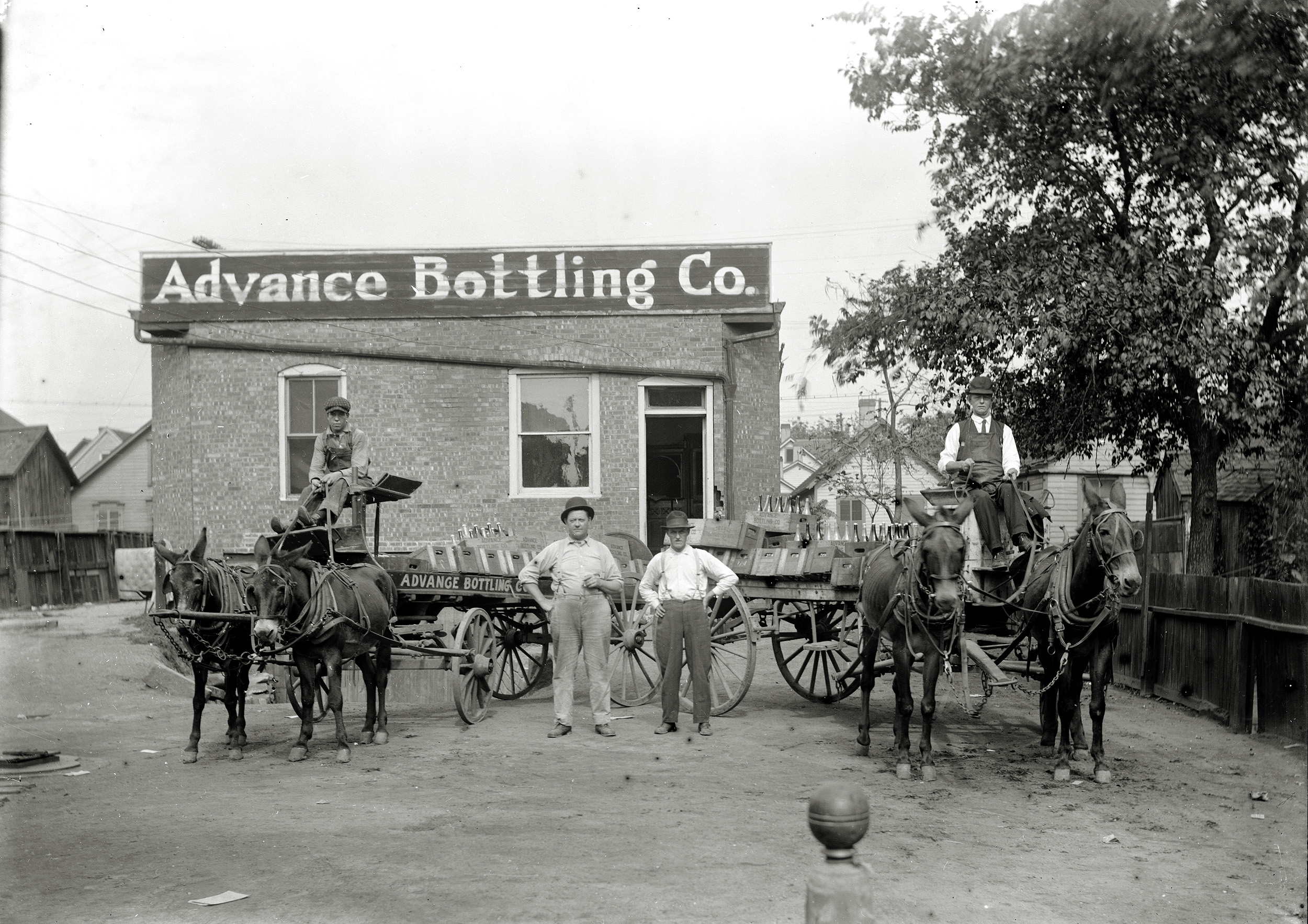 Advance Bottling Works, ABC brand Ginger Ale, Lemon, Strawberry, Grape and other fruit-flavored Soft Drinks, 311-313 Warner Avenue, Peoria, Illinois, circa 1915.

From Peoria City and County, Illinois: A Record of Settlement, Organization, Progress and Achievement, Volume 2, by James Montgomery Rice, 1912:

"William Dorey is at the head of one of the well known productive industries of Peoria — The Advance Bottling Works, manufacturers and bottlers of soft drinks. His life record had its beginning on the 17th of October, 1871, Peoria being his native city. He was left an orphan by the death of his parents when only six months old and was adopted by a family that reared him. His youthful days were passed in this city and he attended the public schools, thus acquiring his education. He afterward engaged in driving a team and later became a street car conductor. He turned from this to enter the ice business and subsequently he engaged in dealing in coal. His next venture was in the feed business and at one time he dealt in gasoline and oil but sold out in that line to engage in the liquor trade, in which he continued in Peoria for six years, then in the manufacture and bottling of soft drinks at No. 313 Warner Avenue." (Permission granted and courtesy of Peoria Historical Society Collections) View full size.