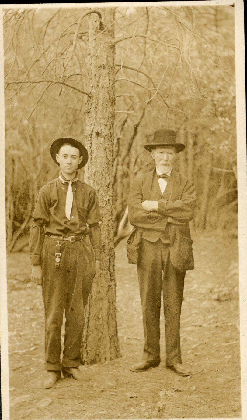 Photo of my great-great-grandfather, Charles Cunningham, and great uncle.  (I think it's Charley Cunningham, though no one remembered to note names on the old photos.)  My guess is that this dates from the teens and was taken somewhere in Northern California.  I'll guess that Charley is a Boy Scout, but I'll bet someone else can identify the uniform better.
Charley's family lived in the South-of-Market area of San Francisco, but after getting chased out by the Great Earthquake and Fire, moved up to Vallejo to live with the grandparents until the city rebuilt.  They ended up in the Mission and finally Castro District of San Francisco back when those neighborhoods were solidly Irish.
Charles emigrated from Ireland in the 1860's, so he must have shook his head at how different life was for his grandchildren in the modern United States.  Everyone looks upstanding and proper here, but I've got another photo of Charles and his wife laughing as they try not to fall out of a hammock.  Even Victorian-era grandparents laughed and acted silly. View full size.
