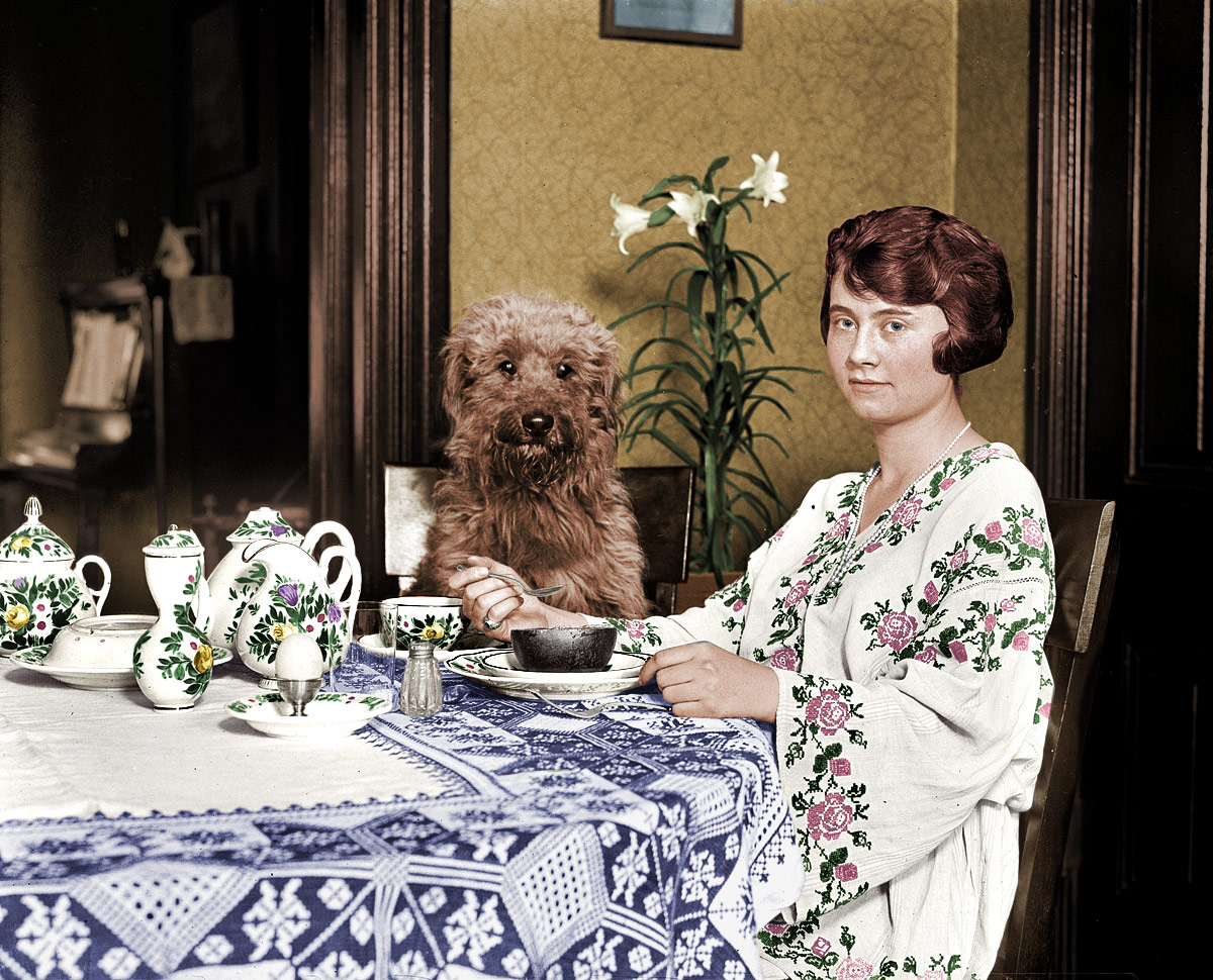 This is one of my favorite pictures on the site (so far). The scruffy dog and Miss Elizabeth's Mona Lisa smile really make the picture. View full size.