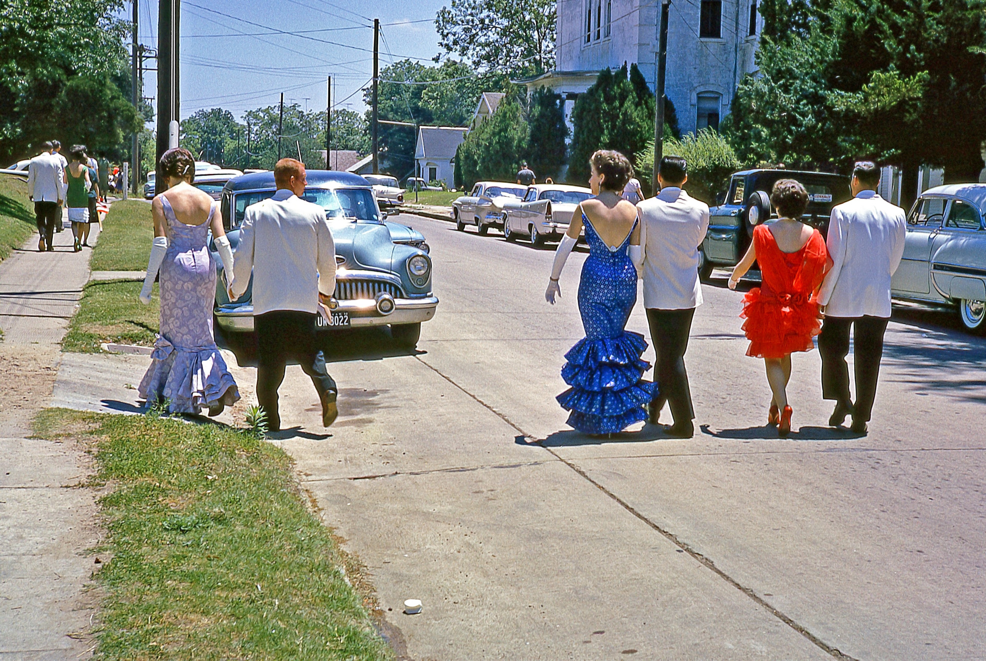 Taken at the Spring Festival in Brenham, Texas. May 1962. You can just make out a Connally sticker in the back window of the pickup across the street. Kodachrome slide, taken by my dad. View full size.