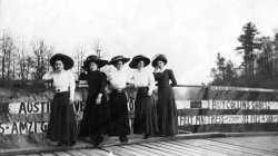 I am guessing this was taken around 1905 in Jefferson County, Alabama.  These are most likely the Moor sisters, Mary, Aileen, Lucille, and Edna.  I looked up Fies &amp; Sons (sign on the bridge): it was a livestock yard at 16th and 2nd Ave. N in Birmingham. View full size.
Tell Me GrasshopperHow big can you make a hat?   How small can you make a waist?  Quite the reverse nowadays.
(ShorpyBlog, Member Gallery)