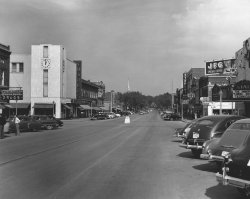 Kingsport, Tennessee, 1952. A modern, planned city; a slice of small town America. The intersection of Broad and Market Street.  Photographer unknown. View full size.