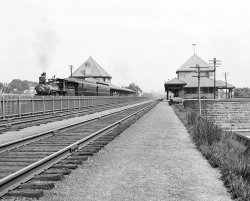 This was one of the stations for the The New York, New Haven and Hartford Railroad. The location is now the home of the Brockton Police Station.  Scanned from the original 5x4 inch glass negative. View full size.