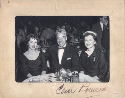 My mother, grandmother and Cesar Romero; San Francisco, CA 1956.
I'm assuming this was taken during brunch based on the mode of dress, table setting and menu offerings.
My grandmother was active in the arts and social circles of San Francisco during this time; I wish I had more of her photos available, I'm sure there were some great photo ops. View full size.
Great photo of regular people!What a wonderful memory. It must have been such fun to live in the Bay Area in the 50's. (I was born in Berkeley in '61)
Three lookersI've always thought that Cesar Romero was exceptionally good looking, and your mom and grandmother were both beautiful!
(ShorpyBlog, Member Gallery)