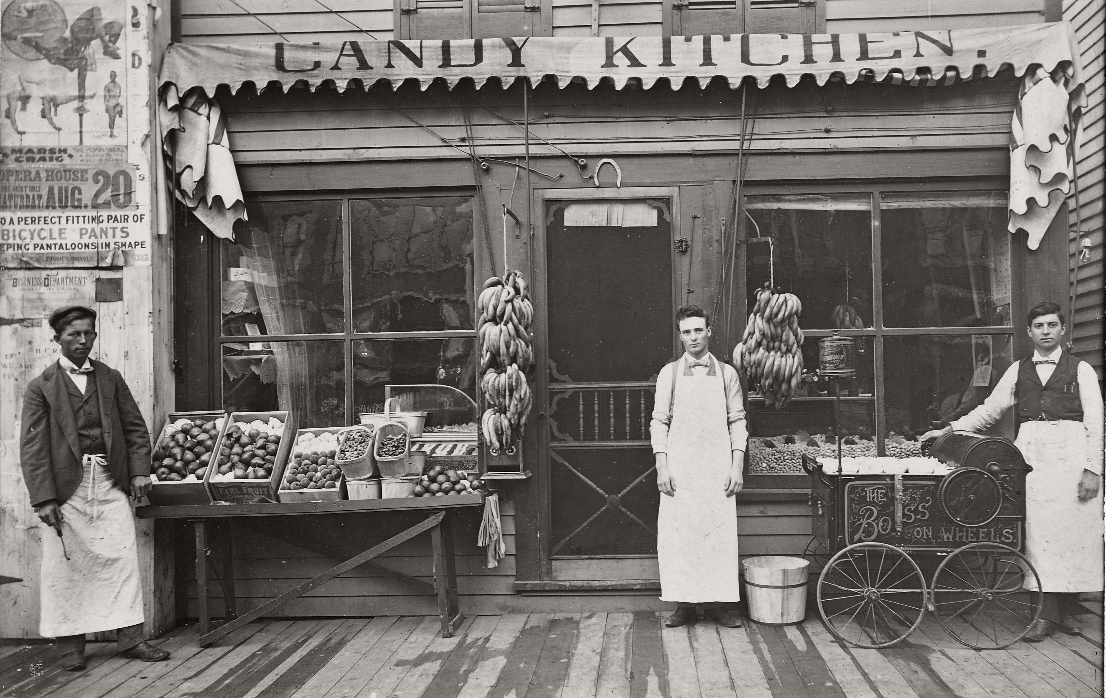 The Candy Kitchen located on Main Street across from the Hildreth Hotel and Opera House in downtown Charles City, Iowa, circa 1906. Glass negative.