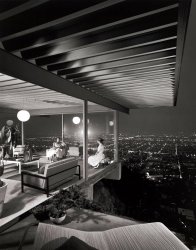 May 9, 1960. A landmark image in the history of modern architecture: Julius Shulman's nighttime shot of Ann Lightbody and Cynthia Murfee in Case Study House No. 22, the Stahl residence in the Hollywood Hills, overlooking Sunset Boulevard. Architect: Pierre Koenig. The photo, taken with a Swiss-made Sinar 4x5 view camera, is a double exposure: Seven minutes for the background, then a flash shot for the interior, the house lights having been replaced with flashbulbs. There's a fascinating account of the image at Taschen, where you can order a book on the Case Study houses. View full size | L.A. Mag article.