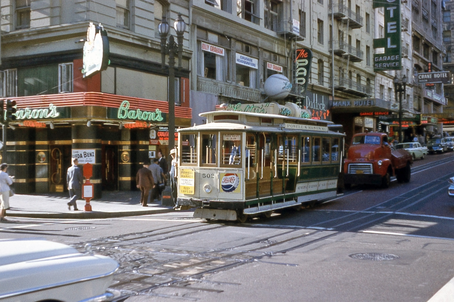 Somewhere in San Francisco circa 1958. The film is Anscochrome and the colors are well preserved. Note the Billy Graham Crusade Headquarters on the second floor!  View full size.