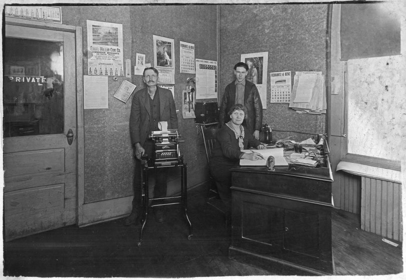 Found among some old documents. Apparently a poultry business in Blooming Prairie, MN. The man is showing off a Dalton adding machine, which they had probably just purchased. Dalton merged with some other companies later in 1927 to form Remington-Rand, making this one of the last Daltons to come off the line. The 1926 price of a Dalton adding machine was $100, the equivalent of a few thousand dollars back then. They must have liked calendars; there are eight on the walls. Scan from 5x7 contact print.
