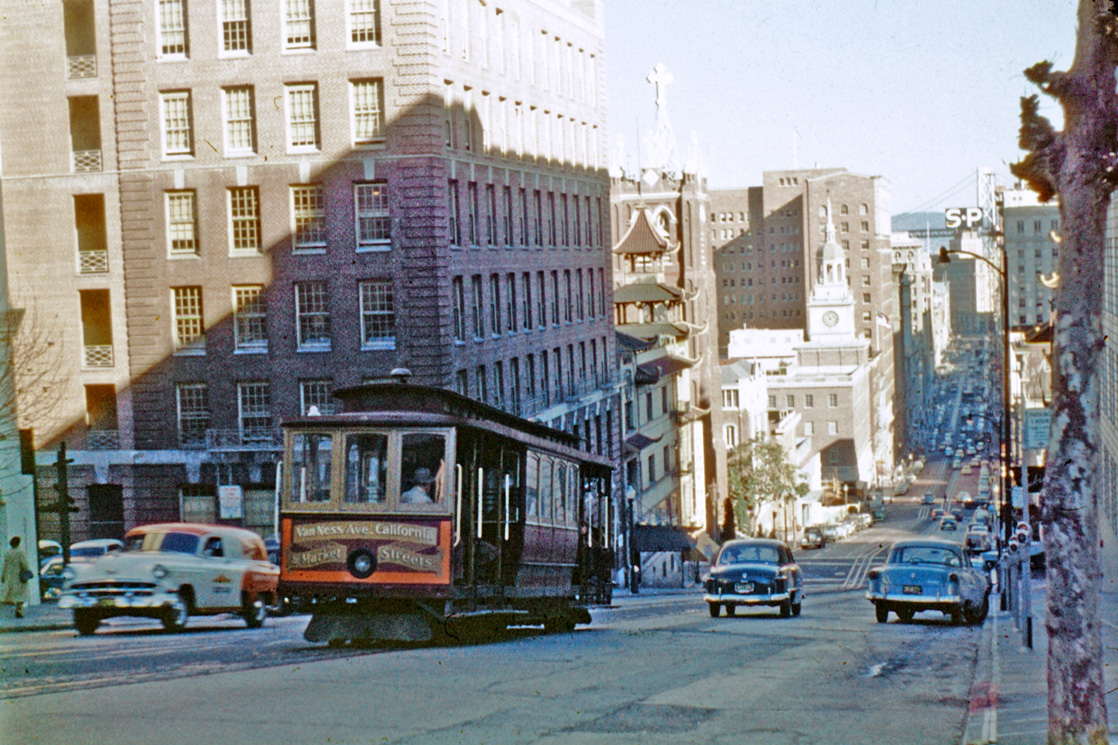 Here's a view of California Street in San Francisco, with the photographer's back to Nob Hill. I like the orange & white station wagon! Anscochrome, 1959. View full size.