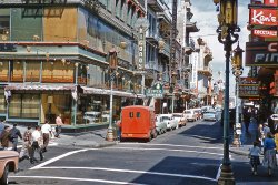Chinatown, San Francisco, August 1957. Taken on the same visit as the drive down the "Vertigo" location. Kodachrome slide, Contax camera. View full size.
SF ChinatownGrant Ave at Sacramento St.
View Larger Map
Ford Day in Chinatown?Along the curb we have a '50-52 shoebox Ford, then a '53, a '55-'56 (looks like '56 trim) Victoria, a '55-'56 station wagon, and a '57.
Mystery Solved!Now we know how the mysterious blue and red smears showed up on Grandpa's step van.
SF ChinatownMapped out and Street Viewed this photo in our SF Bay Area history project, with Ron's permission.
Neon everywhere!That street must have been quite a sight at night! I'm really looking forward to the day when old-fashioned neon signs become so antiquated as to be fashionable again. I really miss them!
(ShorpyBlog, Member Gallery)
