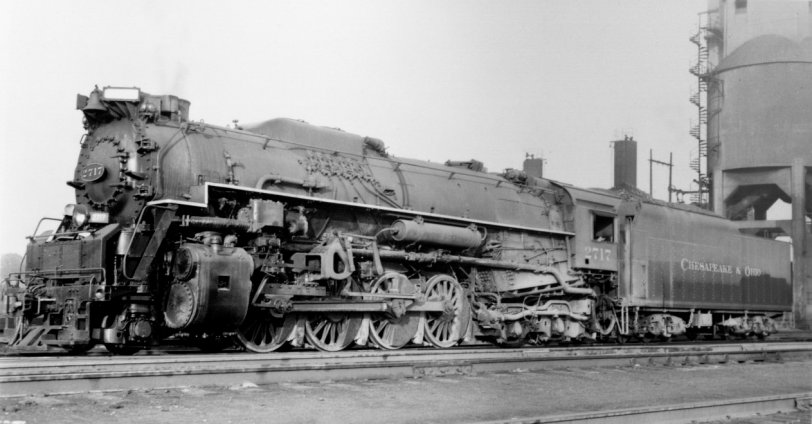 C&amp;O 2-8-4 #2717 at Parsons engine terminal, Columbus, Ohio in July, 1946.  Built by American Locomotive Company, Schenectady, NY 1943.  Due to the road's southern headquarters, the C&amp;O refused to call their 2-8-4's Berkshire types, opting for the title Kanawha after the West Virginia river the C&amp;O main runs next to for many miles. Crews referred to them as 2700's or "Big Mikes", as they were bigger than the 2-8-2 Mikado type.  C&amp;O owned 90 Kanawhas, 70 built by ALCO and 20 built by Lima Locomotive Works.
C&amp;O Kanawhas are probably the most prolific steam age survivors.  About a dozen still exist in various parks and museums, though a couple have been scrapped since due to vandalism and weather deterioration. View full size.
