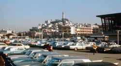 San Francisco's Coit Tower from a parking lot vantage point, March 1969. Taken with a Pentax 35 mm SLR camera. View full size.
ViewI wonder if Coit Tower is visible from this vantage point today?  Many taller structures have replaced these old lower buildings since those days.
[There's been no high-rise construction in this part of the city. This view, from near Pier 43-1/2, would mostly the same today. - tterrace]
(ShorpyBlog, Member Gallery)
