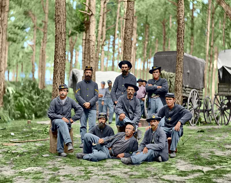 I've developed an interest in colorizing photos from the time before there was color photography. This one looked like the job would be easy, but the trees were very hard to do because the trunks blend so well with the boughs. I'm not satisfied with the flesh tones but they're the best I could do. One Civil War buff told me the coats should be a darker blue but I think those guys were outdoors for weeks and those coats probably faded. Overall, it's not a more interesting photo colorized but I thought I'd share it anyway. View full size.