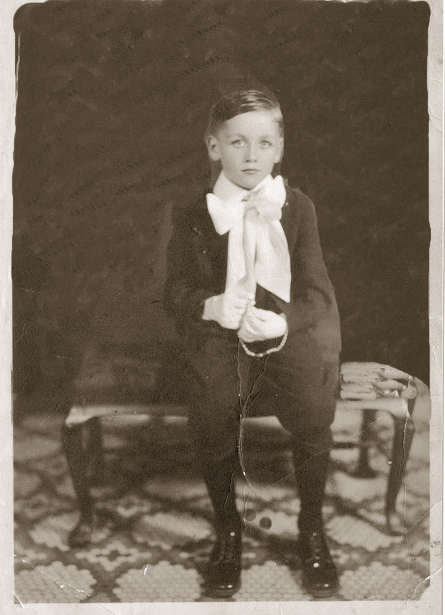 May 1935. Ed Woods in his Our Lady of Lourdes school uniform, West 143rd St. New York City, on Confirmation Day. View full size.