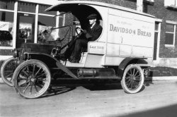 Seattle, Washington, circa 1910. One of several Davidson's Bakery Cadillac delivery trucks with a four-cylinder, copper-jacketed, hand-crank engine. This was supposedly the first automotive bread delivery on the west coast.
