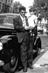 The photo was taken in south Philadelphia on Castle Ave. in front of my grandfather's house. The car is a Plymouth and I believe it is a 1939 model. One day my father was angry at me for playing with the manual choke and stalling out the car. Funny how that still sticks in my mind. I was only 2 years old at that time.