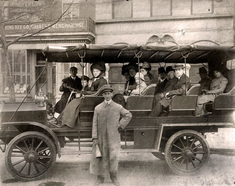This picture was taken in Washington, D.C., c. 1911.  My grandfather is sitting in the front seat with his grandmother. He told me this was a tour bus in D.C. The name of the bus bus manufacturer is the H. E. Wilcox Motor Truck Co. of Minneapolis, MN. View full size.
