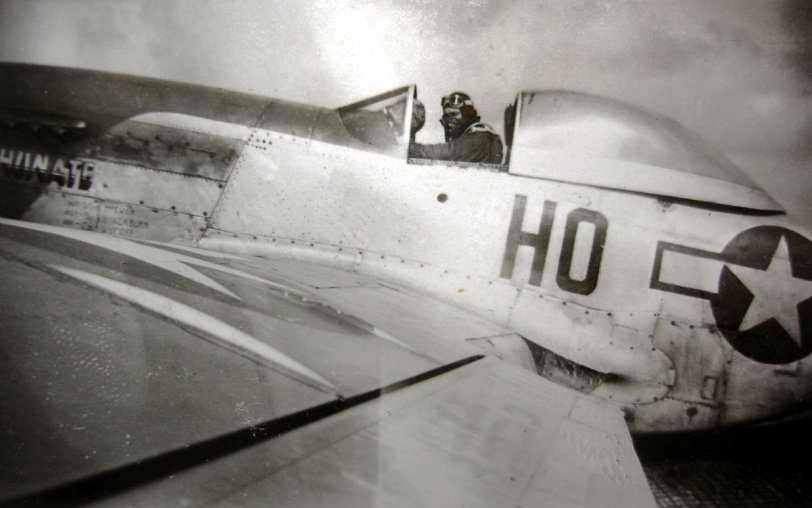 My father, Lt. F.C.Reading, posing in P-51D "Sexshunate."

