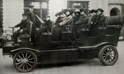 I bought this framed photograph at a garage sale. The vehicle appears to be a Lansden Electric. Apparently the photo was taken on a cold day in New York because the passengers are wearing heavy coats and all have rugs over their knees. The Hotel Bartholdi, it seems, was well known in the period, and a search reveals that the Green Car Sight-Seeing Service made photographs available to patrons. This one is 27 inches by 16 inches. I would like to know more about Green Car, the Hotel, and Lansden. View full size.
- Roverdriver in Australia 
Lansden ElectricThe Standard Catalog of American Cars lists Lansden Electric in business from 1901-1910. The company was taken over by Maccar (as in Mack trucks) after that. Lansden himself left the company to run the electric truck division of General Motors. The Lansden company made passenger and commercial vehicles but discontinued the passenger vehicles in 1908. They were located in Birmingham, Alabama from 1901-1903. They moved to Newark, New Jersey and continued until 1910.
The guide makes no mention of this particular vehicle however.
The Hotel Bartholdi closed in May 1912.
I have one of these photos as well:
http://www.flickr.com/photos/crackdog/6769883575/
(ShorpyBlog, Member Gallery, Cars, Trucks, Buses)