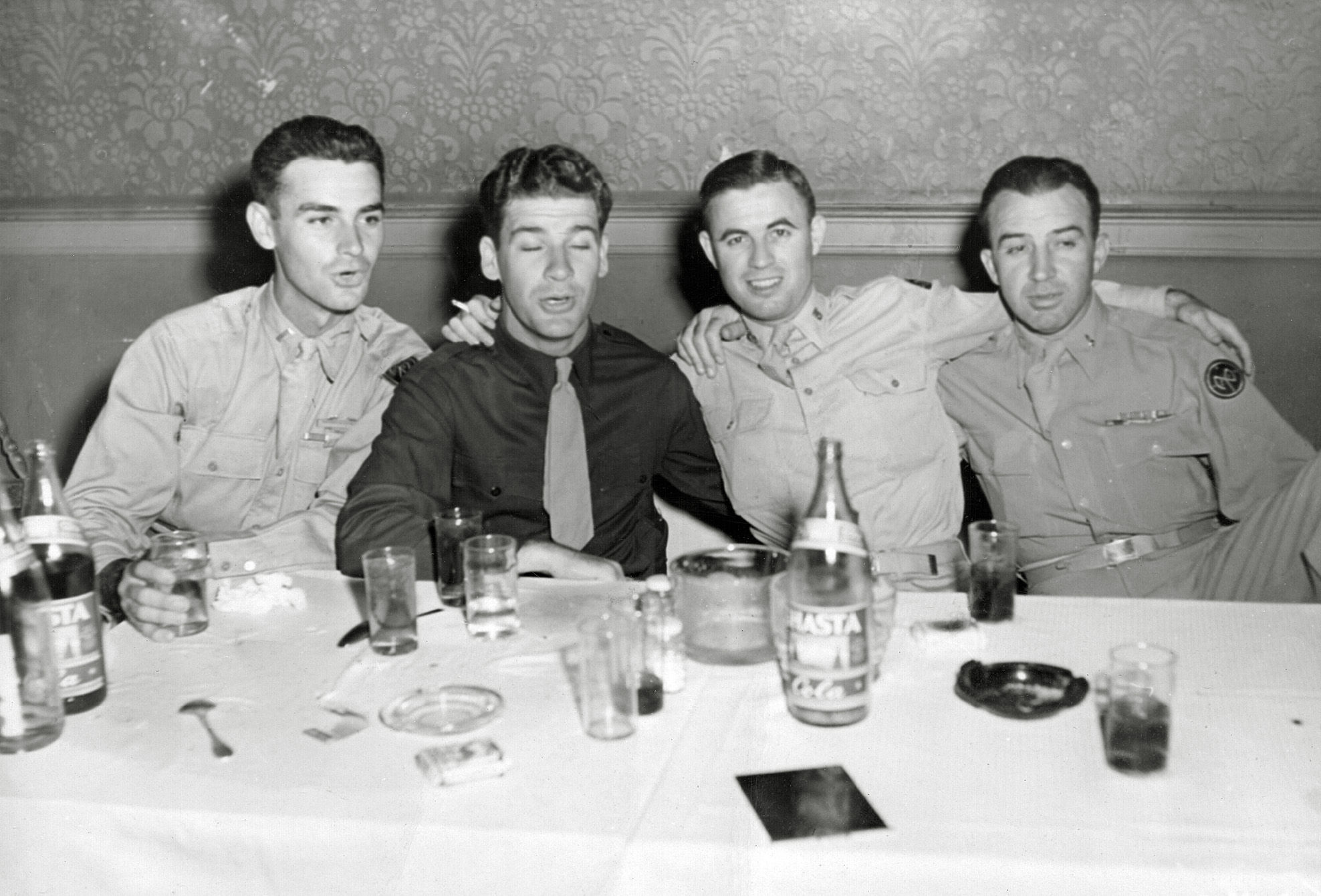 I love this one. This is my Dad's (on the left) first night on the town in the states after more than three years fighting with the 27th ID in the Pacific, around October 1945, near Seattle. He arrived in Washington state from Japan that day after being part of the first occupational forces. These guys are happy to be back! View full size.