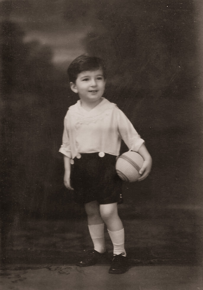 My father poses in a studio shot c. 1930 in Brooklyn. Note the "Mickey Mouse" short pants. View full size.
