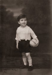 My father poses in a studio shot c. 1930 in Brooklyn. Note the "Mickey Mouse" short pants. View full size.
(ShorpyBlog, Member Gallery)