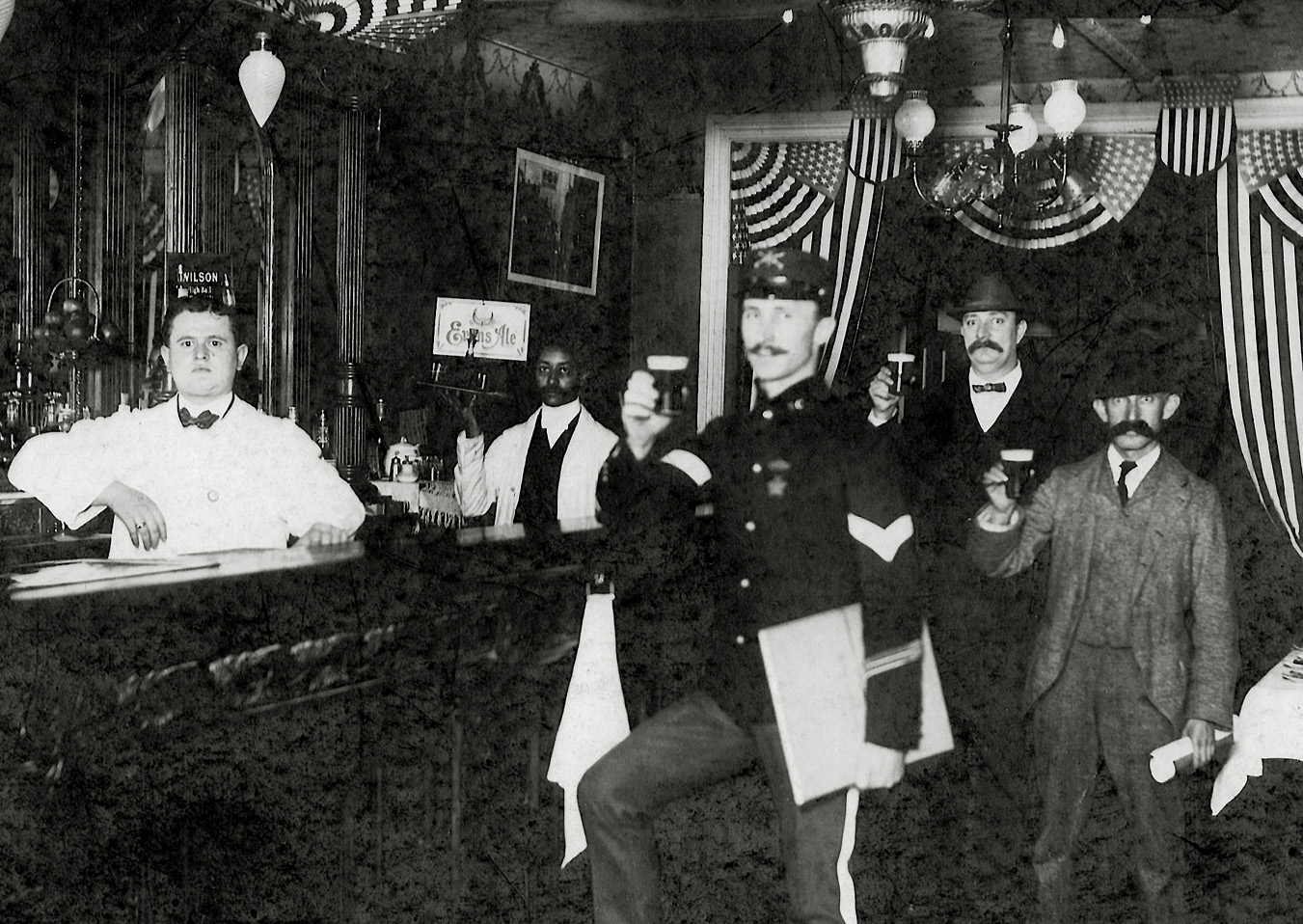 My father's Uncle, August Kappeler, born in Switzerland, who was a cavalry member of Teddy Roosevelt's Rough Riders.  Wonder what they were celebrating.  Don't have a clue as to the identities of the characters in the background or where the bar was. View full size.