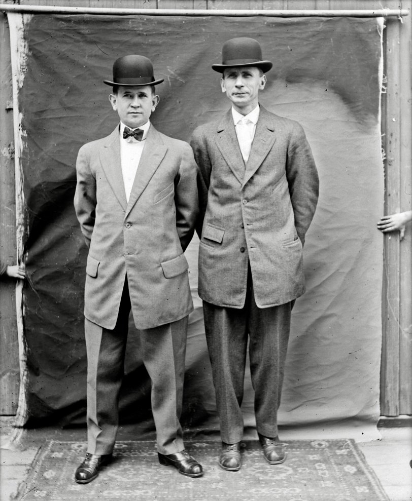 We found a box of 4X5 glass plate negatives in my parents' basement years back.  Here's a scan of one dating back to around 1910 - 1915.  We have no idea who these two gents are.  We're assuming the photographer was somebody in my family.  Pics were taken in and around the Detroit, Michigan. View full size.
