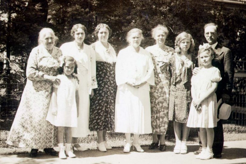 From left to right. Mrs Lobbens, Jean Davis (my aunt), Gertie Lobbens, Katie Lobbens (Jeans Godmother), Adeline Davis (my grandmother), Clara Lobbens, Patricia Davis (my mother), Alexander "Jack" Davis (my grandfather), Margaret Davis (my aunt). Aug 19th 1934. Fargo N.Dakota