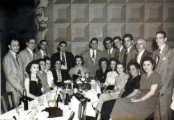 Not sure of exact date but I think early 50s. Picture is of my grand parents and their 9 children and spouses on my fathers side.  My mother and father are 3rd from left. Grandparents and my father came to the USA early 1900s. Lived around Pittsburgh 
PA area. All others born here.

There were also 9 children on my mothers side which sorry to say I do not have a group picture. All of Italian decent but proud to be American.