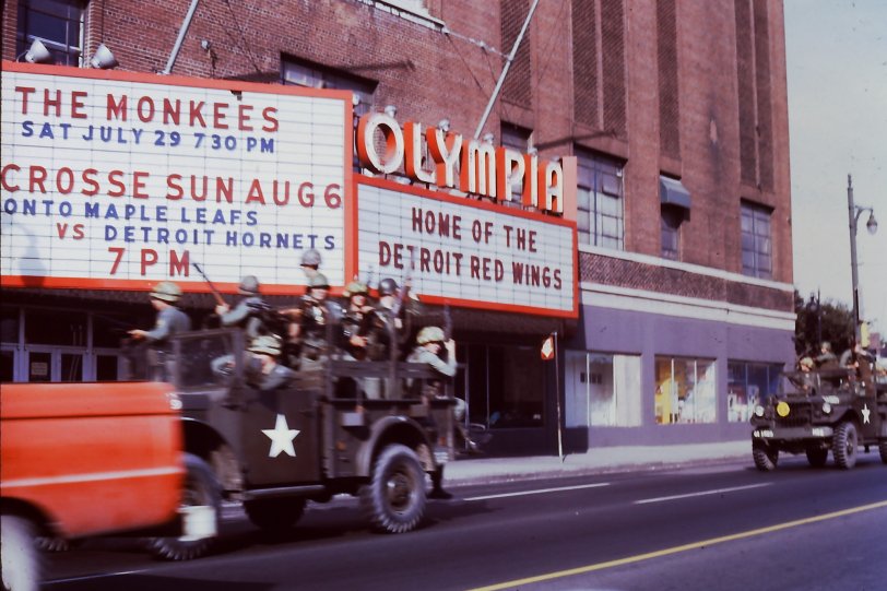 A photo during the 1967 Detroit riots in front of the Olympia. I'm sure it was the Army troops that were the focus of this picture. View full size.
