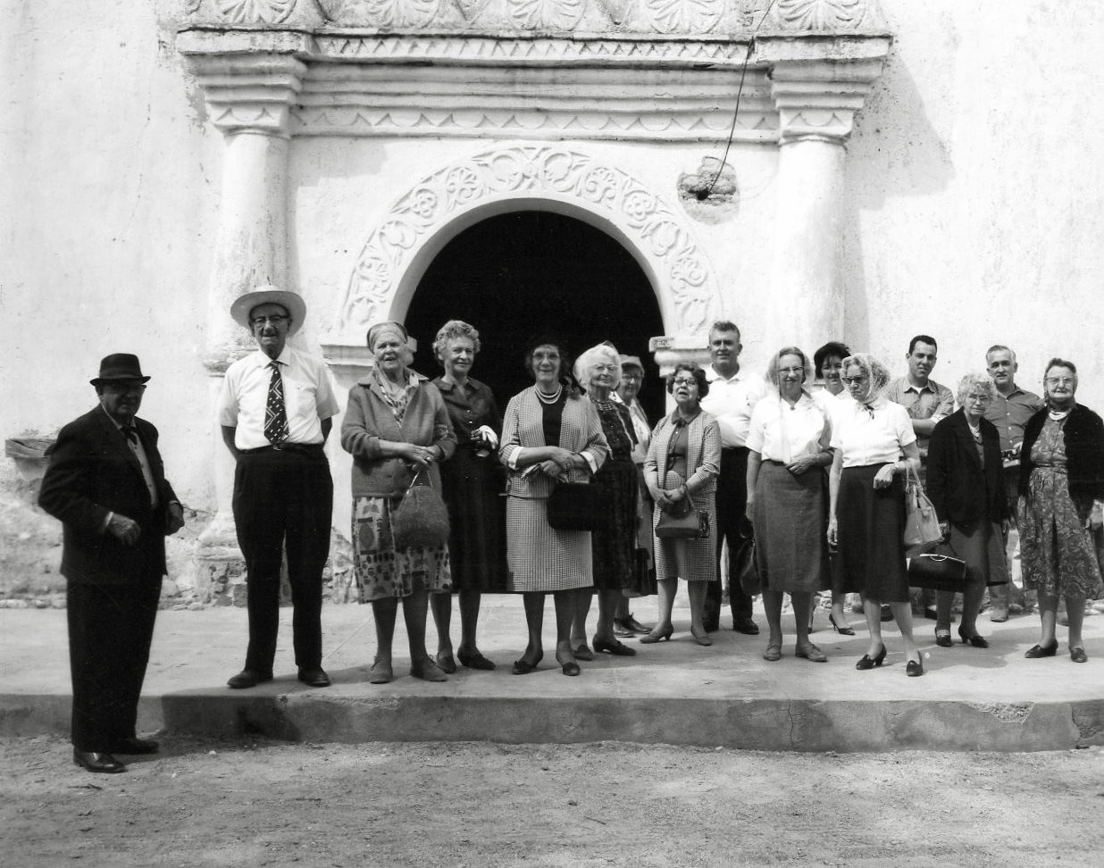 Primeria Alta Society, Nogales, Arizona 1965 group field trip across the border into Nogales, Sonora, Mexico. The trip was to Magdalena, Mexico approximately 56 miles to view where Father Kino might be buried. In 1966 his grave was discovered near the Church. View full size.