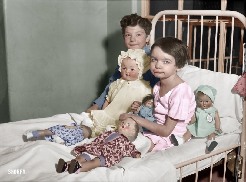 Colorized version of this image showing "children in hospital bed with dolls." Washington, D.C., 1931. Harris &amp; Ewing glass negative. 
This is what children did before computers, cell phones and social media. We may have made great gains in technology, but in my opinion, we lost a lot.

