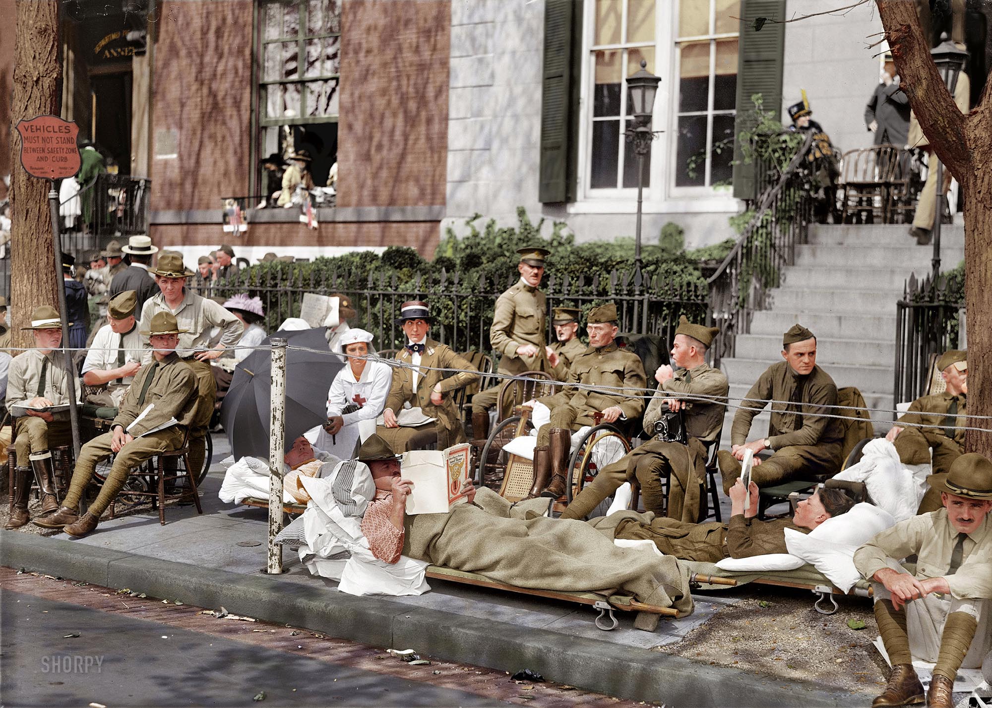 Wounded veterans of the 1st Division, American Expeditionary Forces, prepare to watch the Washington, D.C. victory parade, September 17, 1919. Colorized version of this Shorpy photo.