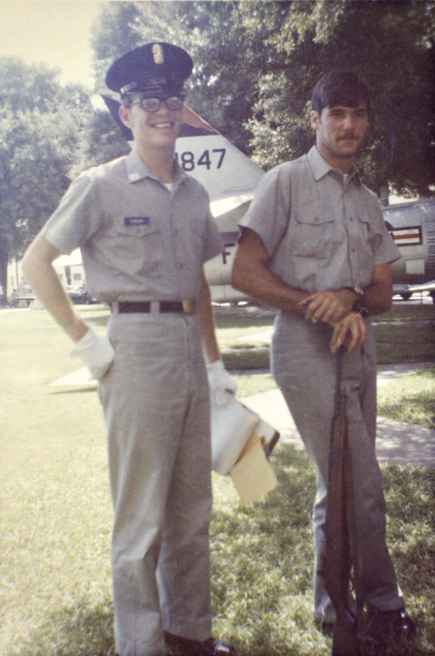 My husband of 41 years, Greg Weber (on the right), and his buddy Greg Duncan, Charleston, South Carolina, September 1972. They had just returned to The Citadel, Military College of South Carolina, for their junior year. Duncan's uniform (including white gloves) denotes his role as Cadet Regimental Staff Sergeant. I asked my Greg how it was that he had the temerity to sport a summer 'stache while on campus, in uniform, albeit without the addition of his Squad Sergeant rank. He said it was the first day back and he'd already gotten his regulation haircut ("My hair looks all right," he claims), and, obviously, been issued his rifle. My Greg, a basketball player from Toledo, Ohio, was at The Citadel on a full athletic scholarship, while Duncan, from Tavares, Florida, attended on a full academic scholarship. Both members of the Class of '74, they're still friends. The picture was taken by my mother-in-law. View full size.
