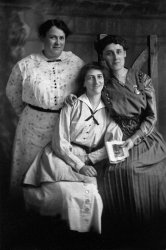 Woman in the center is Edith Perkett, my wife's maternal grandmother. The picture is dated circa 1910, and probably was taken in Keeseville, New York. View full size.
(ShorpyBlog, Member Gallery)