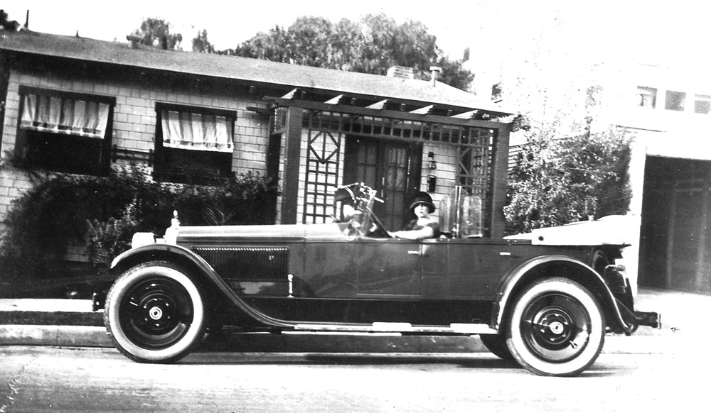 Second Photo of Ed's, as yet unidentified, Roadster, this time there's a young woman at the wheel.

This was taken somewhere in Los Angeles CA, probably in the 1920's